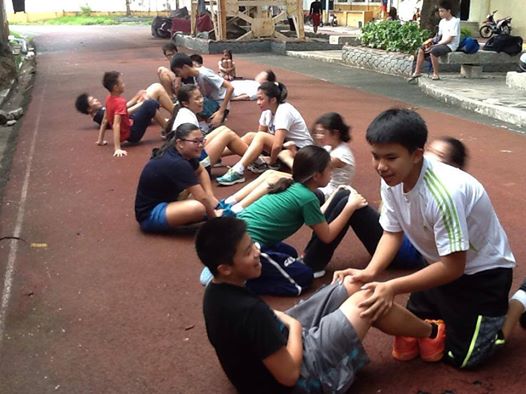 The Chiang Kai Shek College Aquadragons warm up before swim practice at the Rizal Memorial Complex pool grounds.