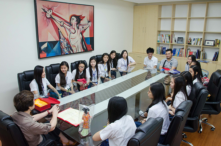 Dr. Poa welcomes the team back to the school, and offers words of encouragement.